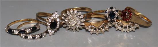Eight assorted 9ct gold gem set rings.